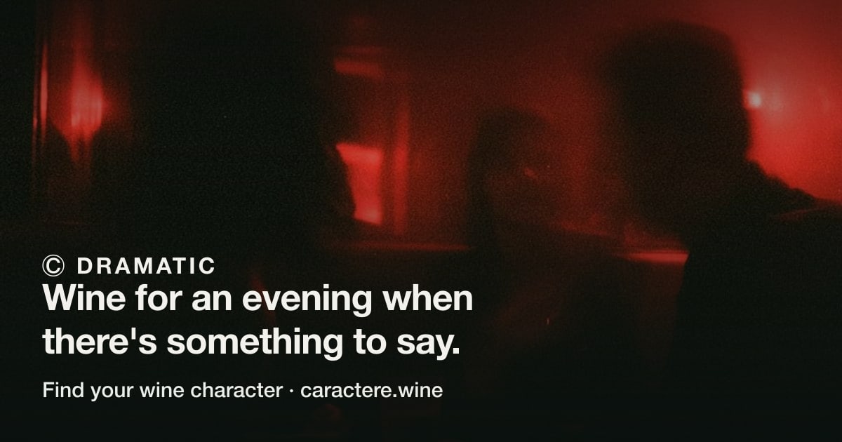 Ⓒ Dramatic — Wine for an evening when there's something to say. Over two people facing each other in a room lit hard red.